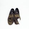 Jarikre black and gold horsebit loafers for men on white background