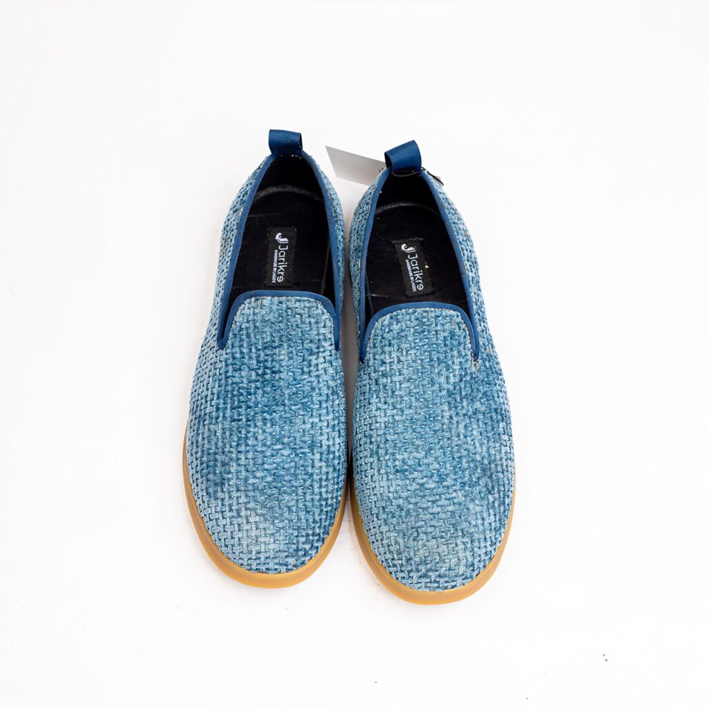 Jarikre blue woven slip on shoes for men on white background