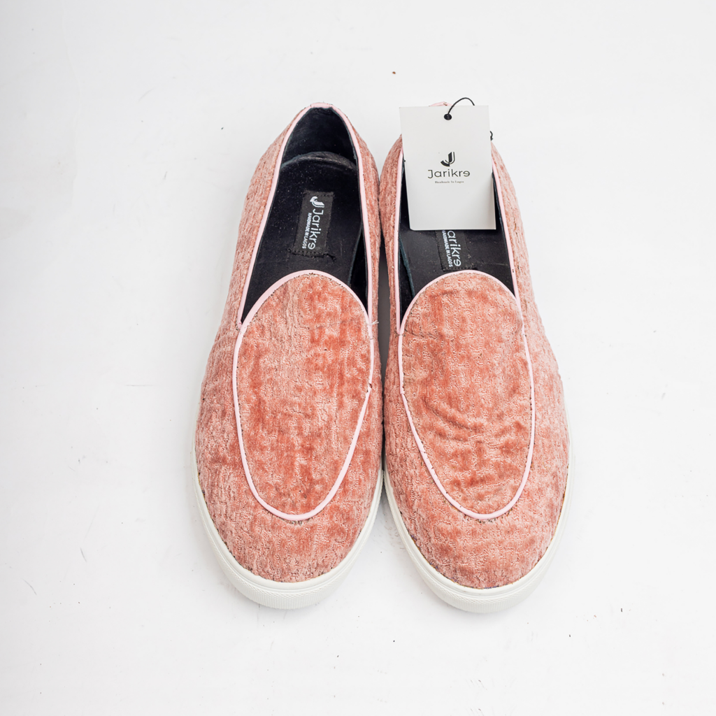 Jarikre pink textured slip on loafers for men on white background