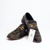 Jarikre black and gold horsebit loafers for men on white background
